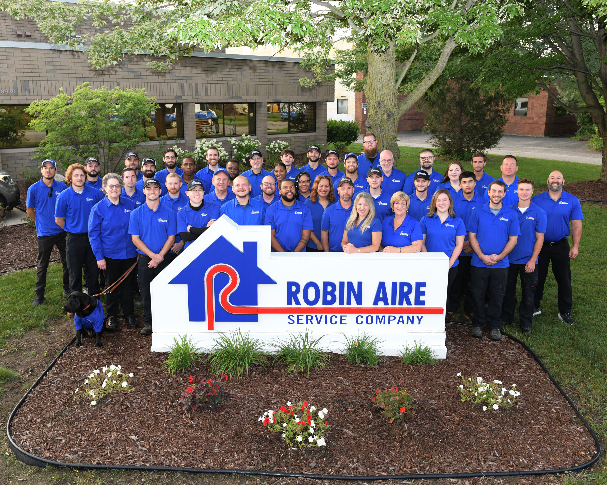 robin aire service company matthew winnie smiling beside servic vehicle