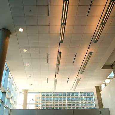 Thin AC vents on the ceiling of an office space